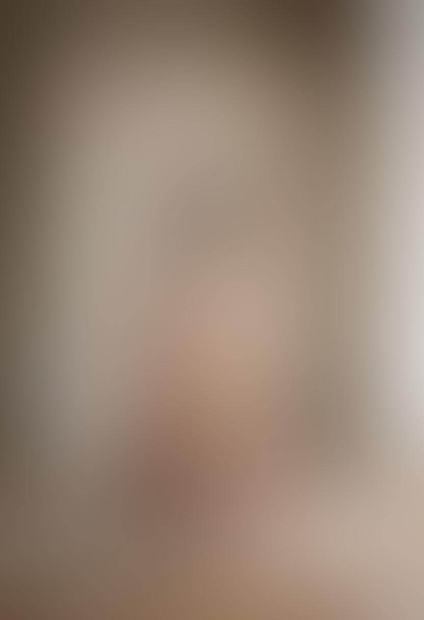 A captivating scene showcasing a beautifully lit photography studio with soft, diffused lighting, where evocative nude models are artfully posed, embodying grace and intimacy. The backdrop features textured fabrics and subtle greenery, enhancing the organic connection between the subjects. Emphasize the delicate interplay of light and shadow to highlight the human form's curves and contours, inviting viewers into a world of sensuality and artistry. super-realistic. warm tones. soft focus.